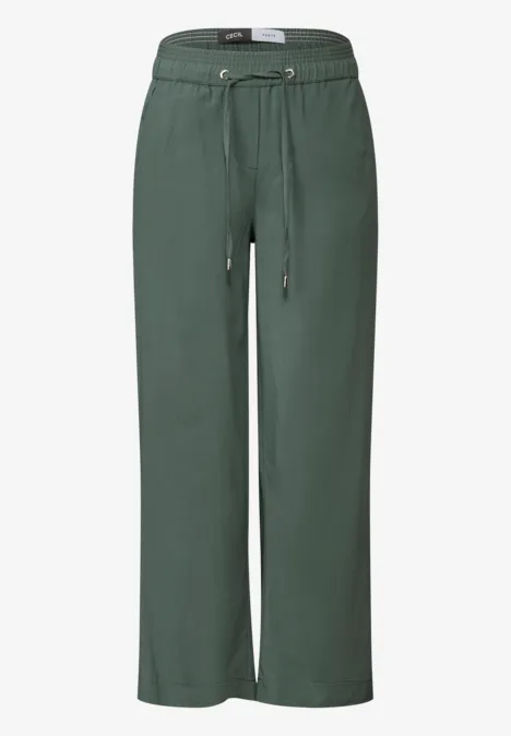 Grüne, weite Hose mit Tunnelzug und elastischem Bund.